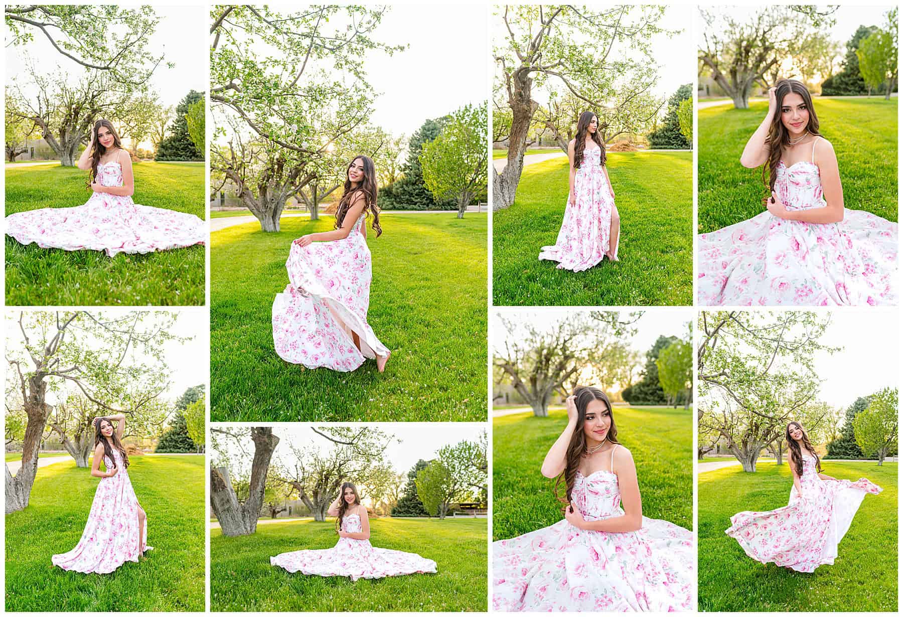 Senior girl in a long, flowy floral dress posing in an open grassy area with trees during her Albuquerque senior photo session.