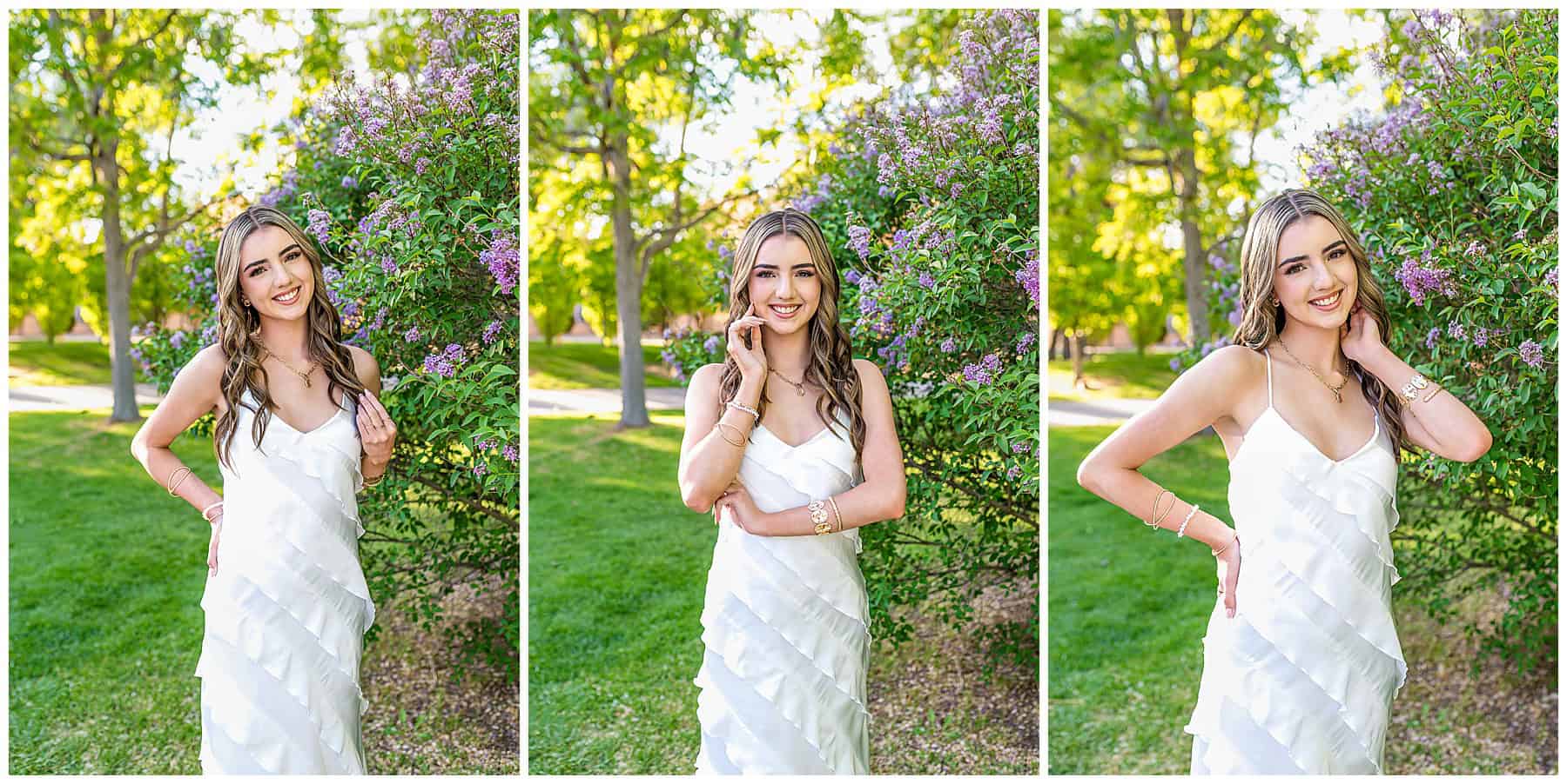 Senior girl from St. Pius High School in a long white dress posing in front of blooming lilac bushes at UNM.