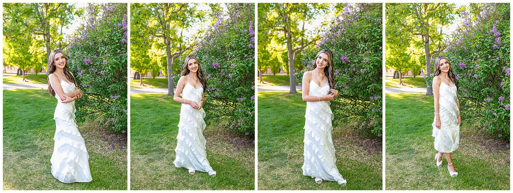 Class of 2025 senior in a flowing white dress standing by vibrant lilac bushes on the University of New Mexico campus.