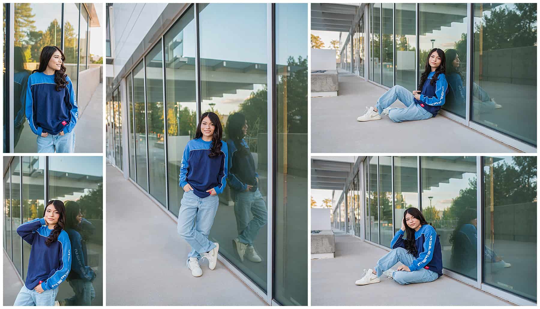 New Mexico high school senior dressed casually in jeans, a baggy top, and sneakers posing against an urban, industrial backdrop in Albuquerque.
