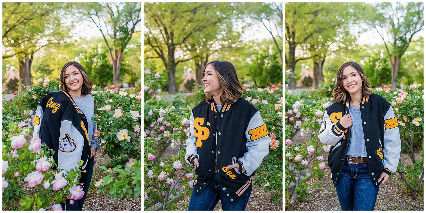 St. Pius senior wearing her letterman jacket posing among vibrant rose bushes at UNM.