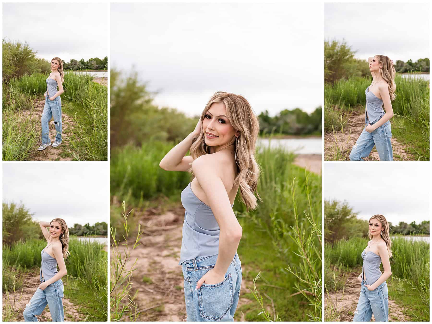 Senior girl looking over her shoulder with soft waves in her hair, surrounded by lush green trees in Albuquerque’s Bosque.