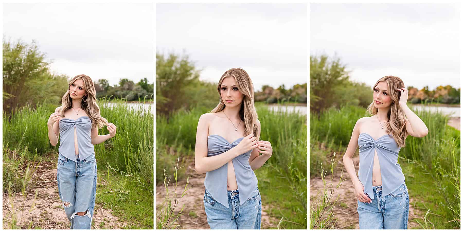 Teen standing with arms outstretched in front of the Sandia Mountains, expressing freedom and joy in a senior portrait.
