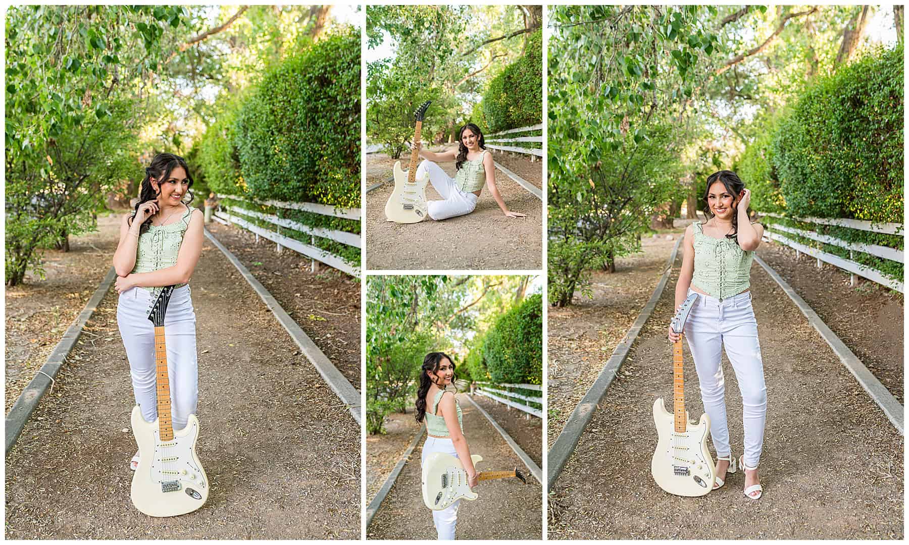 Outdoor senior portrait in Albuquerque of a high school senior holding her father’s guitar on a walkway with greenery and a white fence.