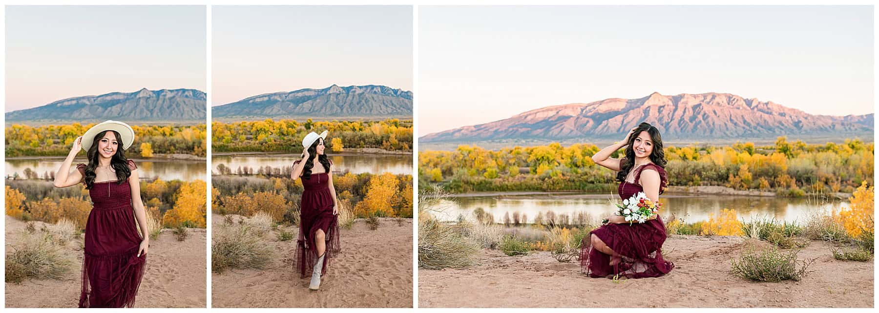 senior girl posing in a maroon dress by the Rio Grande River with the Sandia Mountains in the background. She is wearing a hat and holding a boquet of flowers